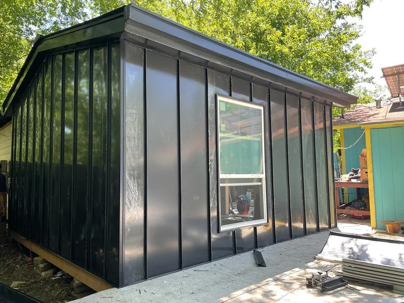 Black standing seam metal wall panels for Metal Roof Installation in Denver