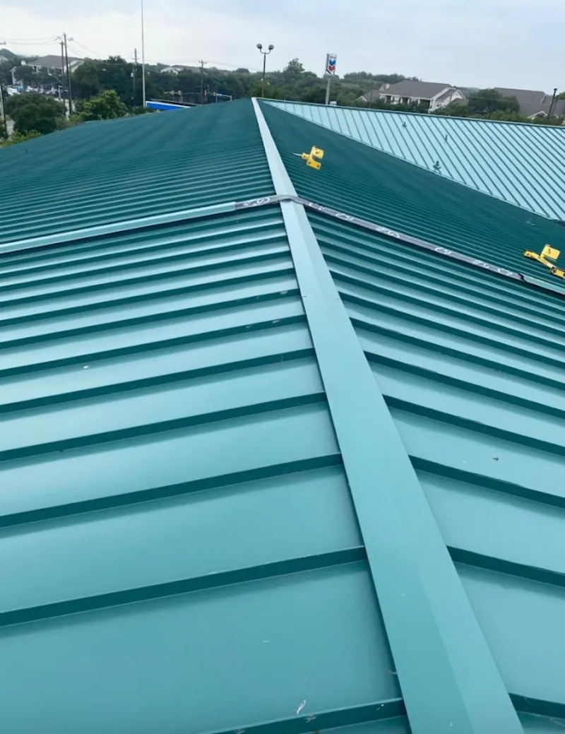 Green commercial metal roof ridge and valley for Metal Roof Repair in Denver