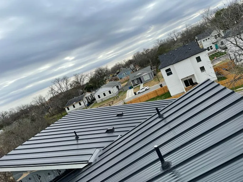 Standing seam metal roof panels with vents for Skylight Repair in Denver